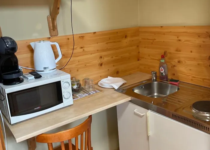 Rozsakert Apartmanhaz Гостевой дом Хайдусобосло